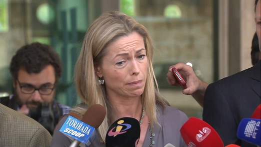 Kate McCann shows the strain as she is interviewed by Portuguese media